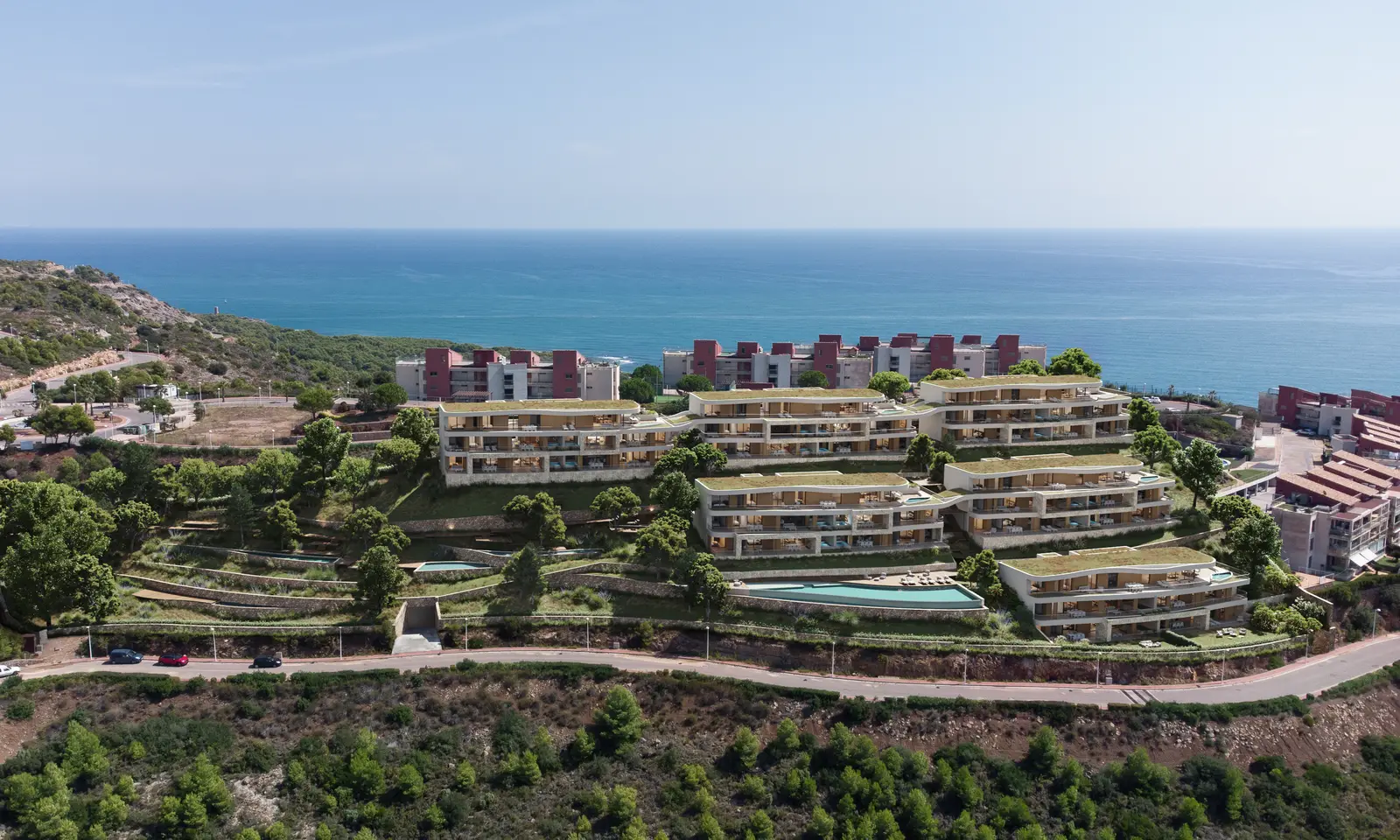 Vista general del residencial Barlovento integrado en la ladera de La Colomera
